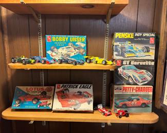 Vintage completed model cars and empty boxes