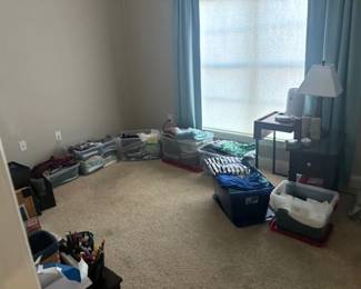 Bins upon Bins of clothing! (We will have racks set up as well)