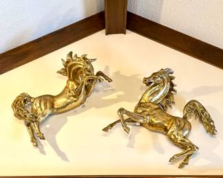 $1500 - pair of brass wall mounted horses - about 28 x 29