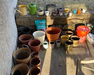 Huge selection of gardening pots, perfect for any springtime gardening and potting needs! A huge five gallon bucket of potting soil, perlite, and decorative potting rocks. 