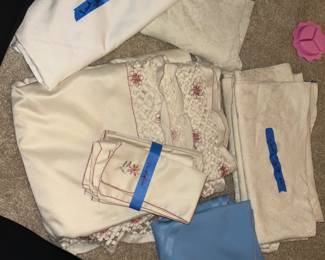 Beautiful table clothes and sets... many more of the teal colored table clothes for round, oval, and rectangular tables + matching napkins. In great condition 