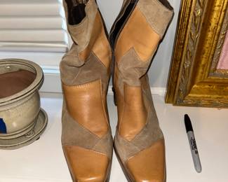 Super adorable vintage patchwork leather boots. Never worn by owner, size 11- could fit a 10 as well. 