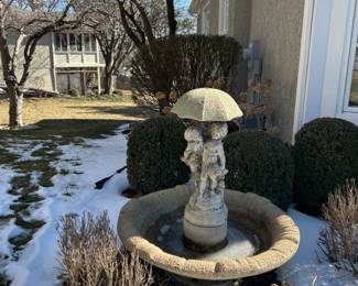 Concrete fountain for sale! Many other concrete sculptures and pots throughout the house