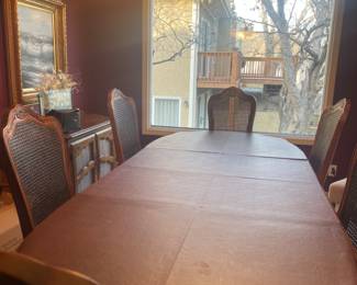 Beautifully crafted, vintage Thomasville table and six Thomasville crafted chairs to match. Table comes with three leafs and table toppers. When table is fully extended it can dine up to 12 people at once! Great for your next dinner party, and is in perfect condition. 