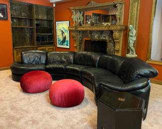 Black Leather Adjustable Headrest Curved Sectional (155"W x 36" Seat Depth x 32" Back Height) & Large Deep Red Upholstered Poofs (28"D x 16"H / pair) 