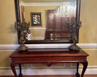 KARGES Georgian Mahogany Clawed Foot Rectangular Console Table (66"W x 20"D x 32"H) with Large Square Wood Framed Wall Mirror (61"W x 61"H) & Pair of French Magnum Spelter Candelabrum / 7 Lights Each / Cherubs Holding Tambourine & Cymbals (13"D x 13"W x 30-1/2"H)