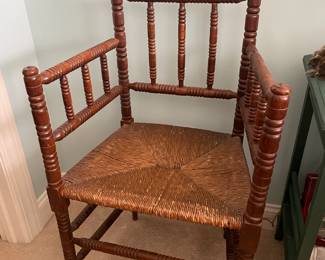 DUTCH OAK AND RUSH BOBBIN TURNED ARM CHAIR