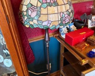 Slag glass shade floor lamp.