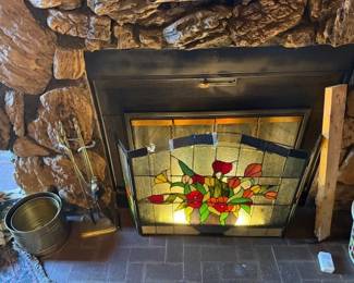 Glass fireplace screen. Some damage on top.