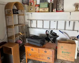 Small Oak dresser. Cane shelving unit. Old primitive tins.