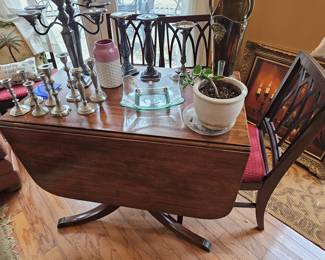 Drop leaf table with four chairs $248