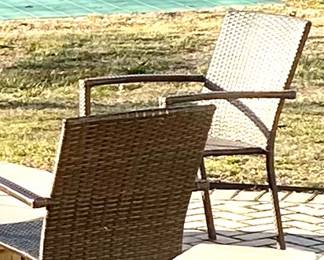 Set of four woven patio chairs
