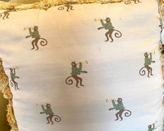 One of six down pillows in monkey pattern