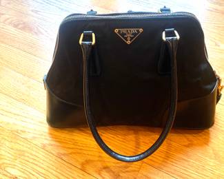 Prada (authenticated)