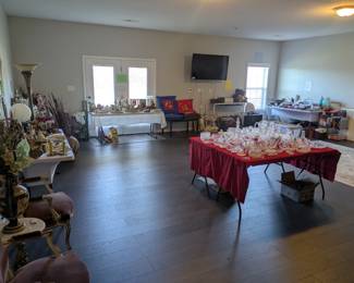 The huge basement room displays asian art, office supplies, Christmas decor & collectibles, crystal dishes, various collectibles, assorted china etc. Another basement room has most of the bed linens