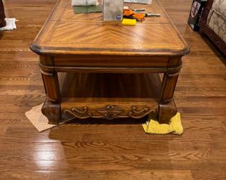 Entertainment coffee table with hidden storage on each end. Matching sofa table and two end tables also.