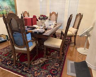 Large dining table with two leaves and a custom pad.
