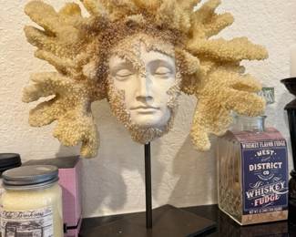 Coral  & plaster sculpture of woman's face on metal stand