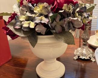 Floral centerpiece in pretty white urn