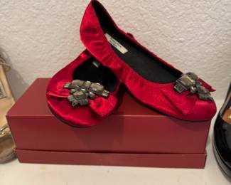 Vera Wang red satin flats with jeweled bow finish.