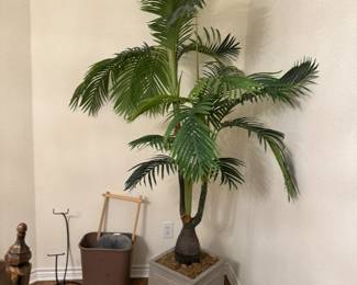 Faux palm tree in planter