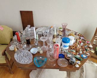 Hexagonal dining table with two leaves.