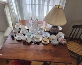 Beautiful antique kitchen table with fold down wings. 