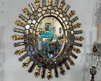 Oval giltwood Spanish sunburst mirror