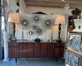 1940s Inlaid Macassar Ebony Art Deco Credenza; Pair of Carved Sphinx Lamps, Collection of Post Modern Sunburst Mirrors; Pair of Van Teal Lamps; and more