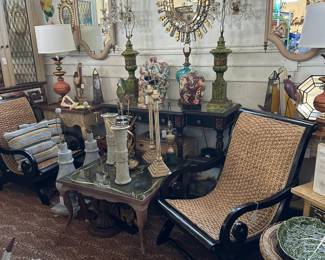 Pair of British Colonial Lounge Chairs; Italian Eglomise Cocktail Table; Pair of 1950s Painted Mirrors; Pair of Irish Crystal Sconces; and more