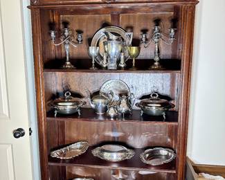 Vintage Book/Display shelf filled with Silver Plate Serving Pieces