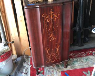 Sheet music cabinet and rug