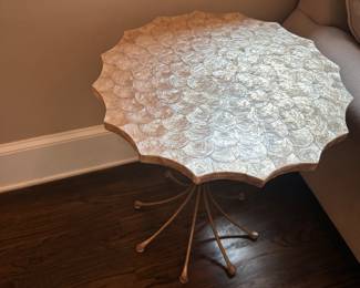 Modern capiz shell side table with scalloped edges from Arteriors