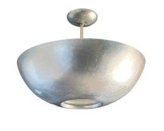 A large vintage plafonnier in modern style with an inverted half dome shape, silver leaf finish and a light diffuser at base.