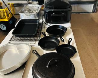 Cast iron.  Vintage.  Imagine how may pieces of bacon were cooked in them.   Pure respect.   