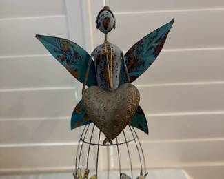 Metal Woman With Dangling Heart Decor