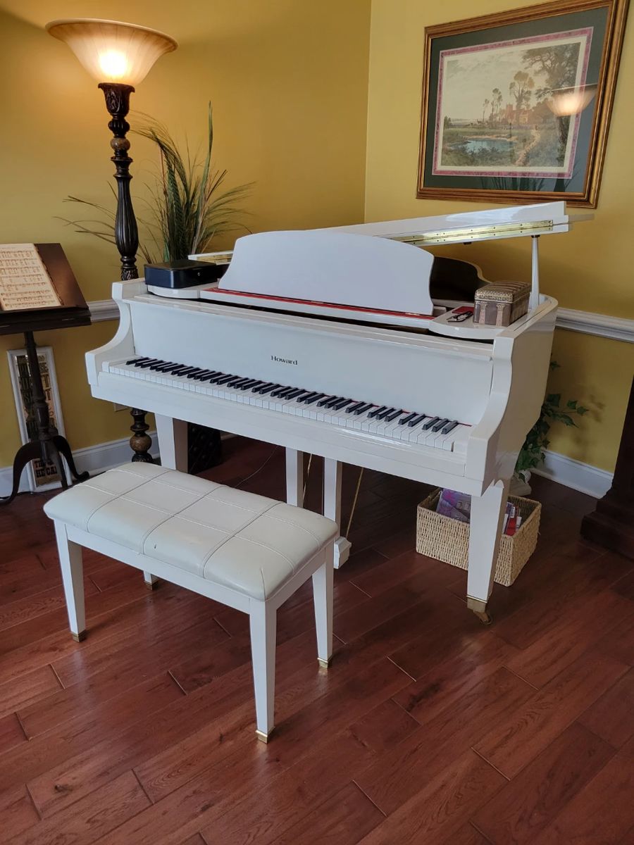 Howard Player Grand Piano . Hooks to WiFi and plays music. Lovely!