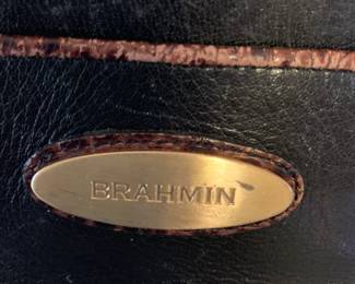 #62	Brahmin brown leather purse with bag	 $60.00 
