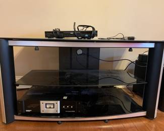 #39	entertainment center with glass top and shelf 46x24x23	 $20.00 
