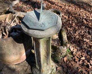 #108	metal sundial on concrete stand, 26" tall	 $25.00 
