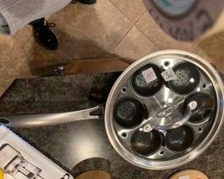 #75	calphalon skillet with lid and egg cooker	 $20.00 
