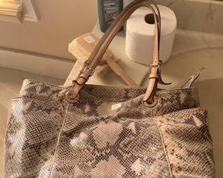 #53	Michael Kors alligator print leather purse	 $20.00 
