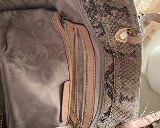 #53	Michael Kors alligator print leather purse	 $20.00 
