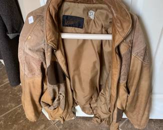 #50	winlit tan leather jacket, size small	 $50.00 

