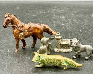 (5) Metal Animal Figurines
Dog is stamped Spoon Pewter
Lion is stamped pewter
Lighthouse is stamped Kirk pewter
Fox appears to be made of bronze 
Horse has no markings

