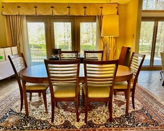 Table is 41” round & includes 3-20” leaves for a max length of 101” oval. Includes qty 6 dining chairs from Bassett Furniture.