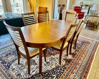 Rug is 100% wool handmade @11x7’, with tones of navy, rust, agua green, and brown. It’s lush and beautiful in perfect condition, as is everything in this home.