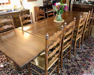 Gorgeous oak dining table with 2 extensions and 10 chairs