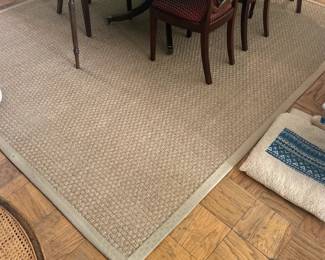 Many matching Natural Fiber Rugs of varying sizes throughout the home