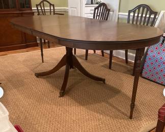 Antique Mahogany Leaf Dining Table - 29.5” H x 42” Diam x 2 leaves at 20” each